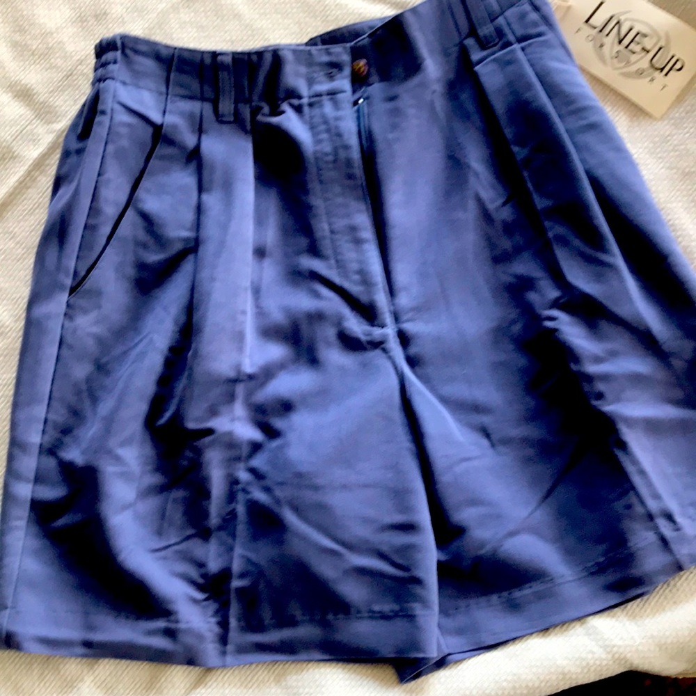High waisted blue shorts.